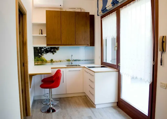 Apartment Front With Loft Bed And Pool Bardolino